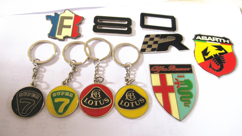 car keychain and badge